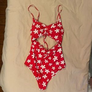 NWOT Pink Lily cut out one piece swimsuit